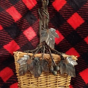 Vintage 14" x 8 vintage wicker basket metal leaves